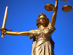 statue depicting the scales of justice